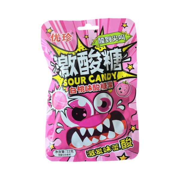 Konfety Ujane Snoot kislye so vkusom persika 22g